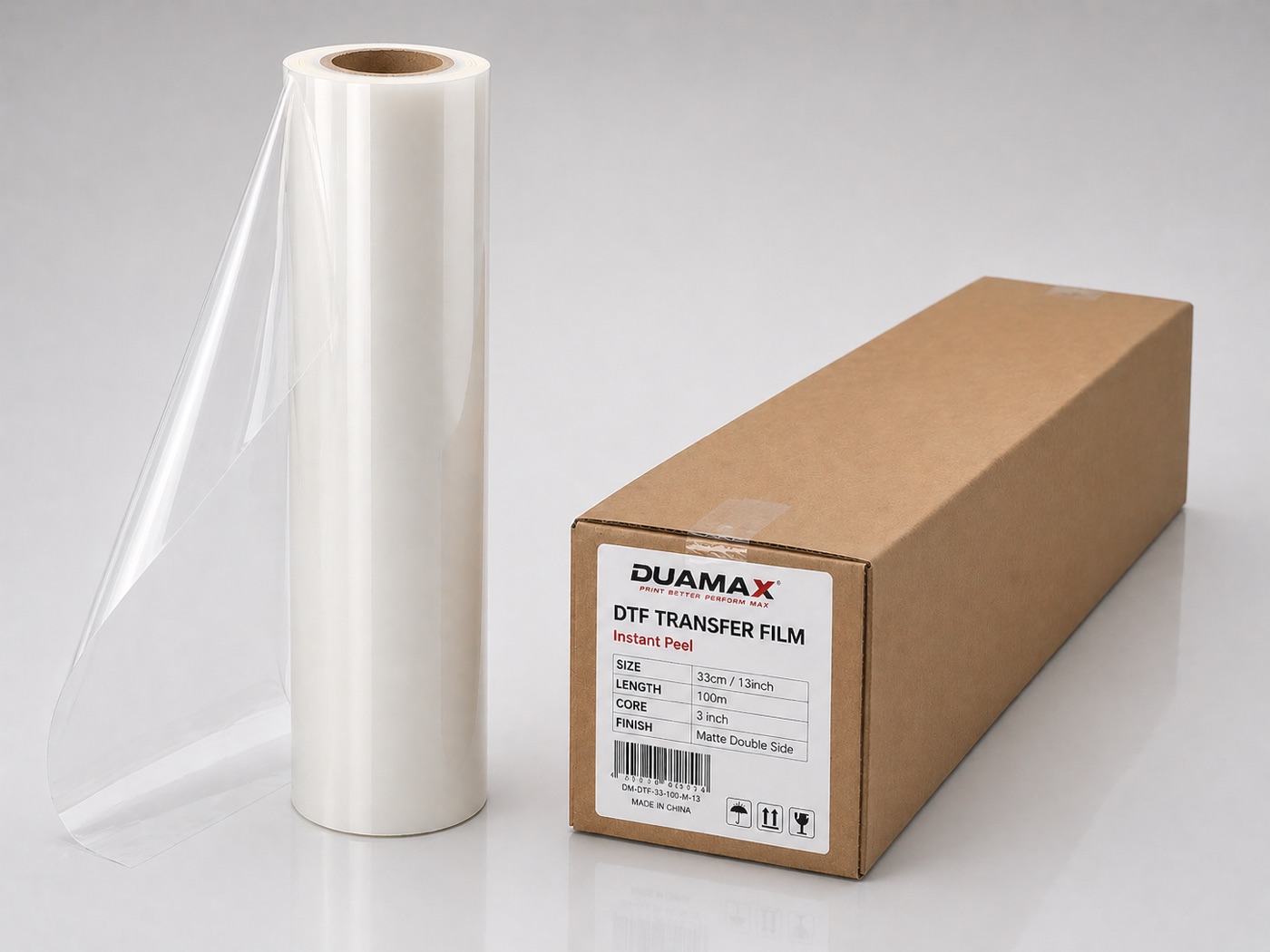 13" instant-peel DTF transfer film roll with its shipping carton