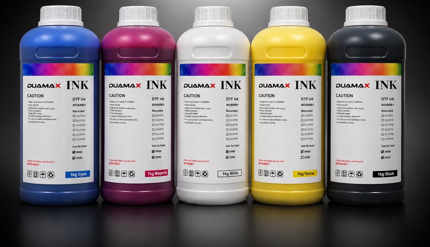 DTF ink in 1 kg bottles — cyan, magenta, white, yellow and black
